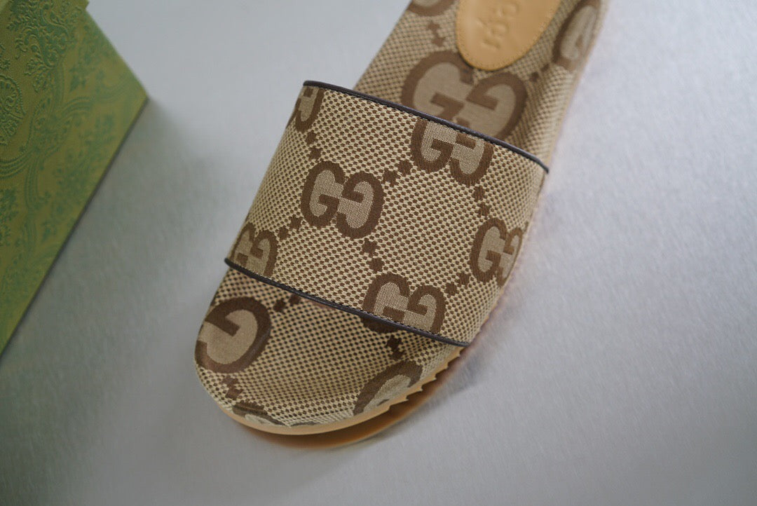 Gucci maxi GG canvas slide sandal