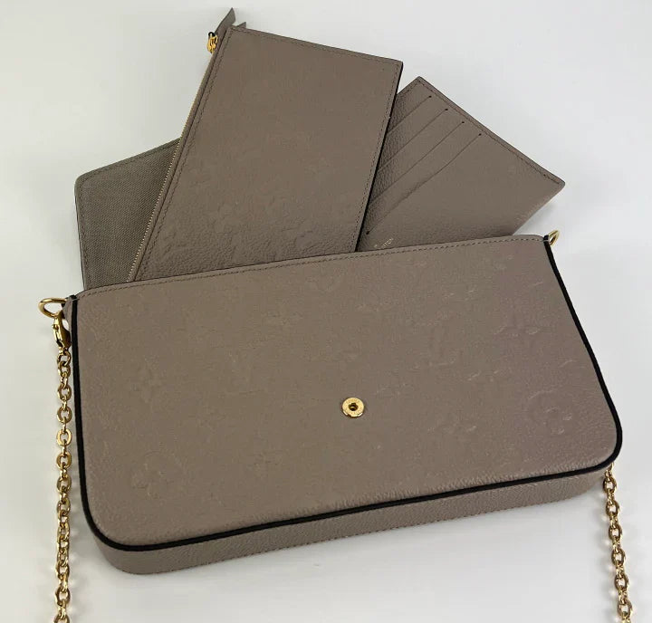Bolsa Louis Vuitton empreinte pochette felicie in dune