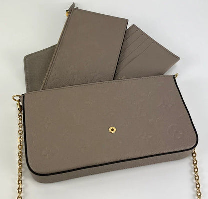 Bolsa Louis Vuitton empreinte pochette felicie in dune