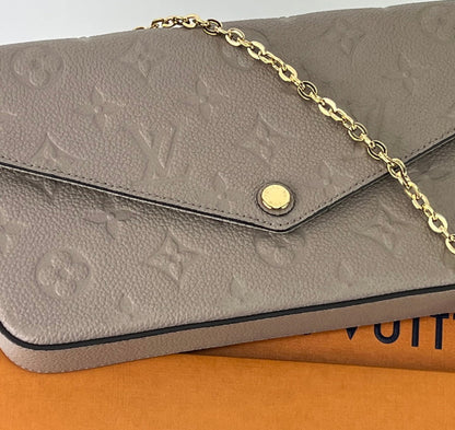 Bolsa Louis Vuitton empreinte pochette felicie in dune