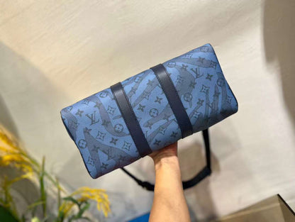Louis Vuitton Black, Blue Taurillon Monogram Keepall